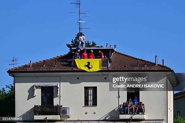 Ferrari fans watch from their balcony the second practice session for the 2025 Emilia Romagna Formula One Grand Prix at the Imola autodrome in Imola,...