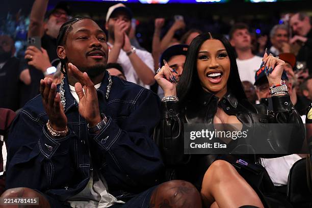 Player Stefon Diggs and rapper Cardi B sits court-side during the first quarter in Game Four of the Eastern Conference Second Round NBA Playoffs...