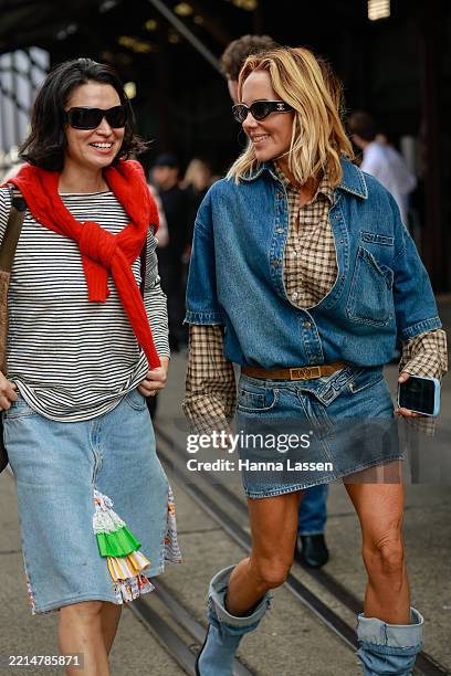 Pip Edwards wearing black Chanel sunglasses, denim shirt, denim miniskirt, Louis Vuitton brown belt and denim boots during Australian Fashion Week...