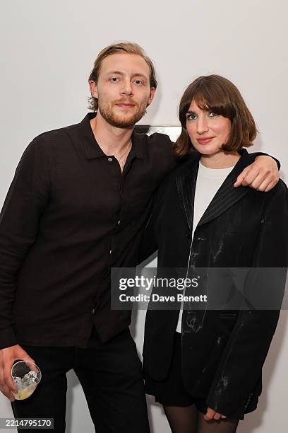 Oliver Lyttelton and Victoria Williams attend a private view of 'In Tandem', a new exhibition at the newly relocated Cob Gallery on Lamb's Conduit...
