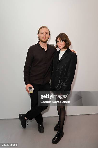 Victoria Williams and Oliver Lyttelton attend a private view of 'In Tandem', a new exhibition at the newly relocated Cob Gallery on Lamb's Conduit...