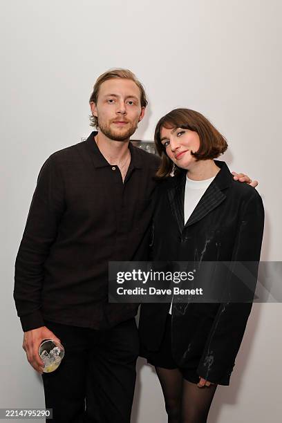 Oliver Lyttelton and Victoria Williams attend a private view of 'In Tandem', a new exhibition at the newly relocated Cob Gallery on Lamb's Conduit...