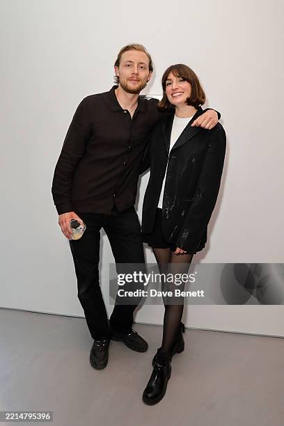 Oliver Lyttelton and Victoria Williams attend a private view of 'In Tandem', a new exhibition at the newly relocated Cob Gallery on Lamb's Conduit...