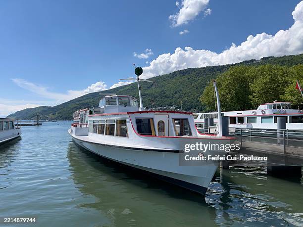 tourboat at harbor of biel lake at springtime - passenger craft stock pictures, royalty-free photos & images
