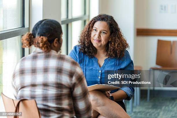 mental health professional listening to patient during counseling session - fragility stock pictures, royalty-free photos & images