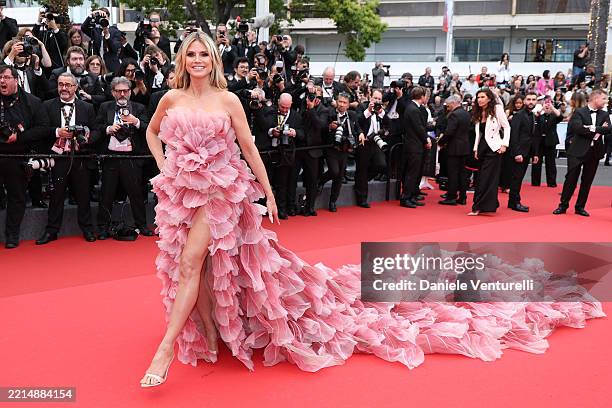 Heidi Klum attends the red carpet for the opening ceremony and "Partir Un Jour" screening at the 78th annual Cannes Film Festival at Palais des...