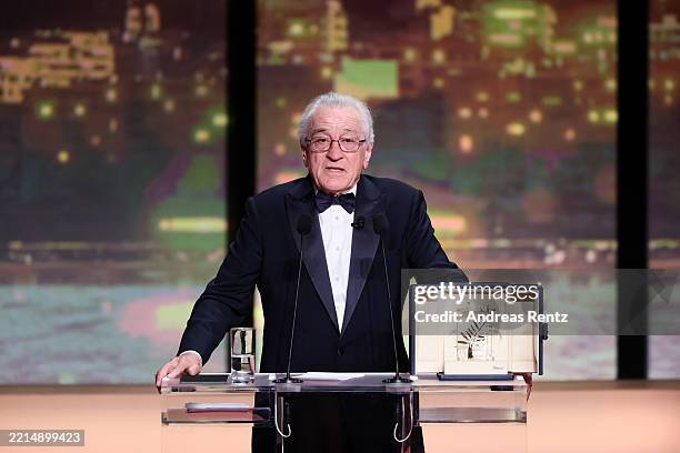Robert De Niro accepts the honorary Palme d'Or onstage during the opening ceremony at the 78th annual Cannes Film Festival at the Palais de Festival...
