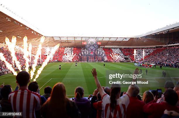 General view inside the stadium during a pyrotechnics display, as a black cat tifo is displayed prior to the Sky Bet Championship Play-Off Semi Final...