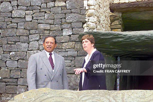 Malaysia's Royal Highness Yang di-Pertuan Agong King of Malaysia listens to Claire Tuffy manager of the Bru na Boinne centre as they visit New...