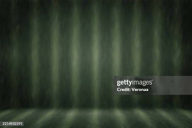 olive green shade striped panoramic studio background. - green studio background stock illustrations
