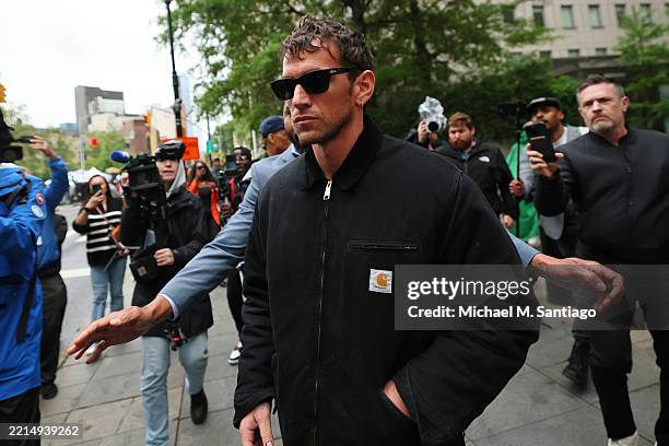 Alex Fine, Cassie Ventura's husband, leaves for the day during the trial of Sean "Diddy" Combs at Manhattan Federal Court on May 13, 2025 in New York...