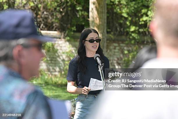 Liza Nielson, former Starbucks worker, speaks during a campaign gathering at Governors Park in Denver, Colorado, on May 13 to collect signatures for...