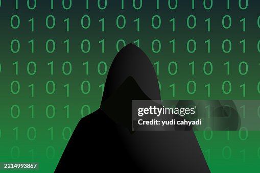 Cybersecurity data breach concept : Hacker wearing Mysterious Hooded Figure with Binary Code Background Cybersecurity data breach concept : Hacker wearing Mysterious Hooded Figure with Binary Code Background