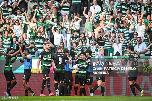 Sporting Lisbon's Portuguese forward Pedro Goncalves celebrates scoring the opening goal during the Portuguese League football match between Sporting...