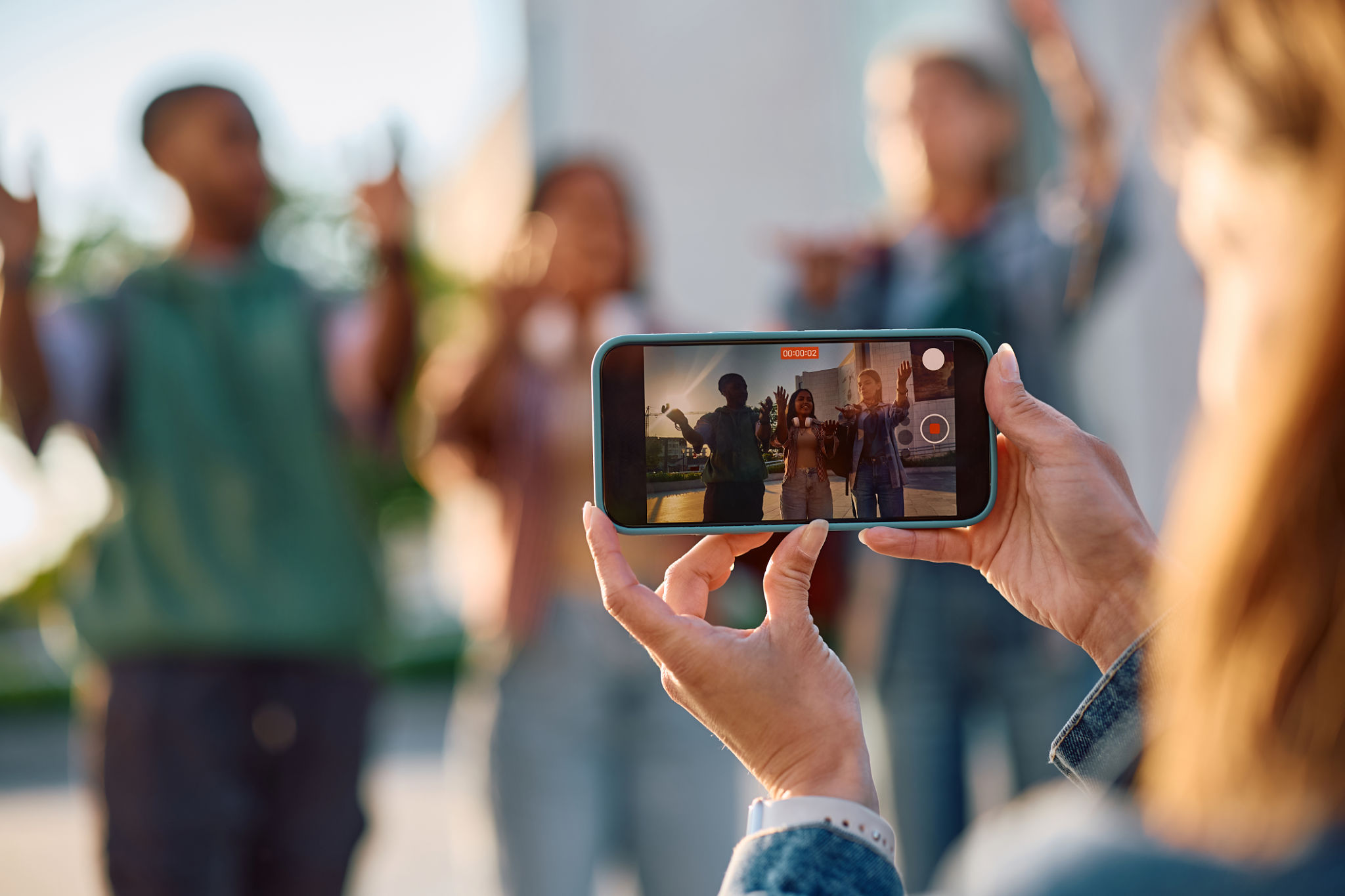 people recording stories