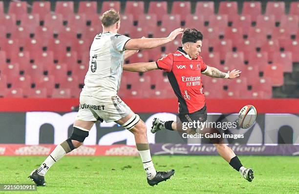 Bronson Mills of the Lions clears the ball during the United Rugby Championship match between Emirates Lions and Ospreys at Emirates Airline Park on...