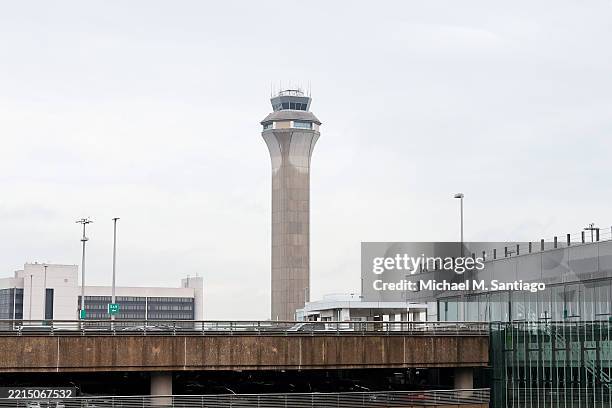 Traffic tower is seen at Newark Liberty International Airport on May 14, 2025 in Newark, New Jersey. A shortage of air traffic controllers continues...