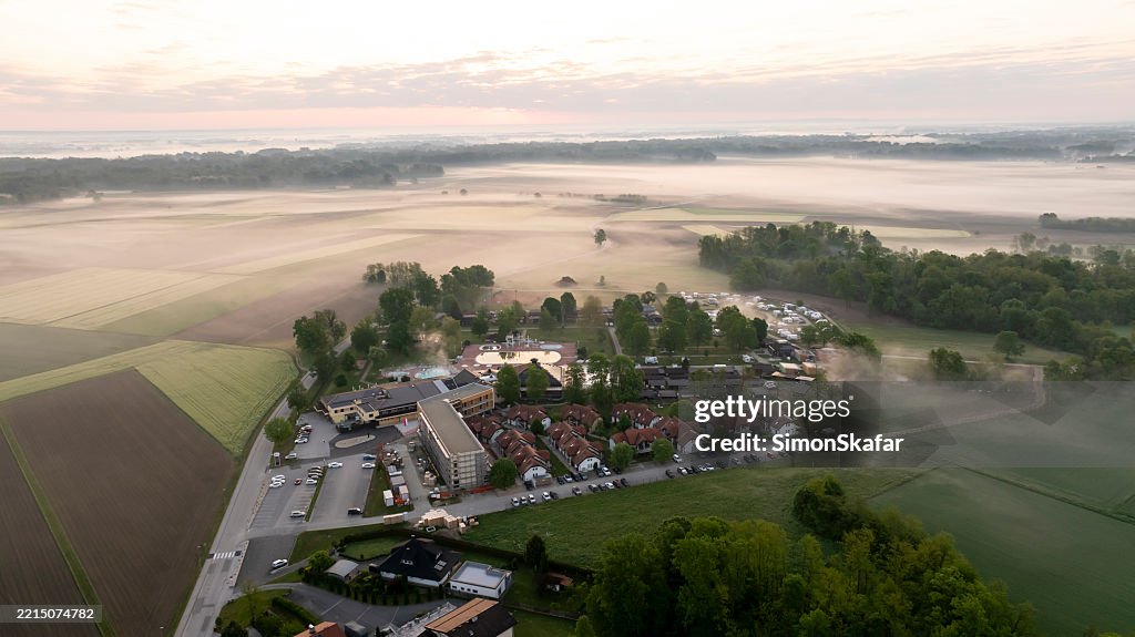 Fog Covering the Countryside Surrounding a Thermal Bath Resort at Dawn
