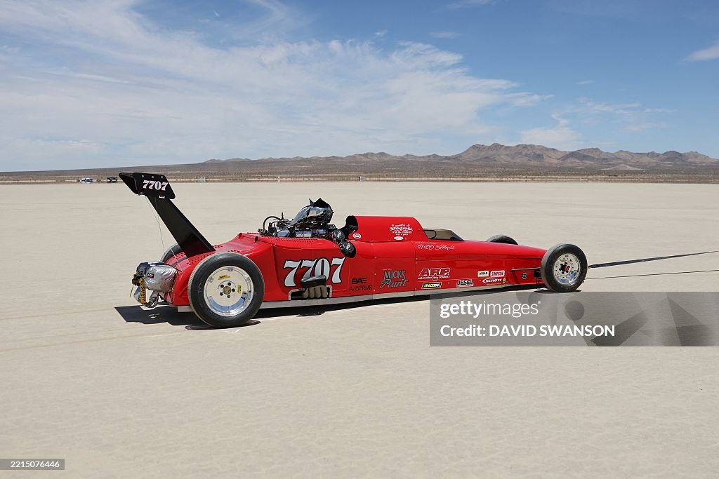 Scta Racing A Lakester, a style of vehicle in land speed trails, is towed through ...