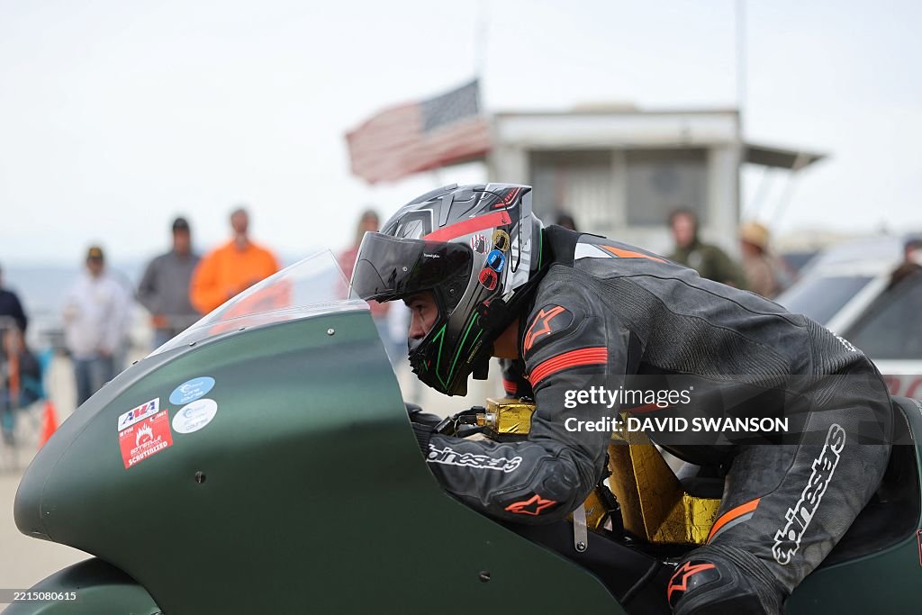 Scta Racing CORRECTION / A driver readies himself ahead of the time trials as ...