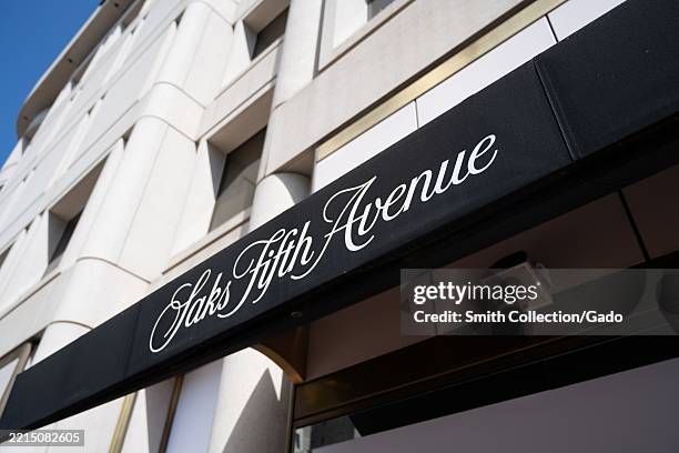 Awning with Saks Fifth Avenue logo outside department store on a clear day, San Francisco, California, May 13, 2025.