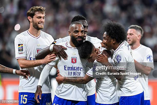 Alexandre Lacazette of Lyon celebrates with his teammates after scoring a goal during the France Ligue 1 match between Olympique Lyonnais and Angers...