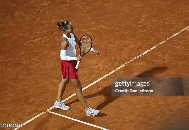 Qinwen Zheng of China celebrates match point against Aryna Sabalenka during the Women's Singles quarter-final match on Day Ten of the Internazionali...
