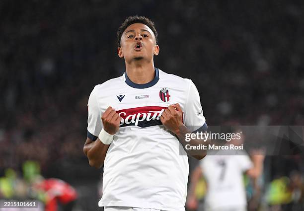 Dan Ndoye of Bologna celebrates scoring his team's first goal during the Coppa Italia Final match between AC Milan and Bologna at Stadio Olimpico on...