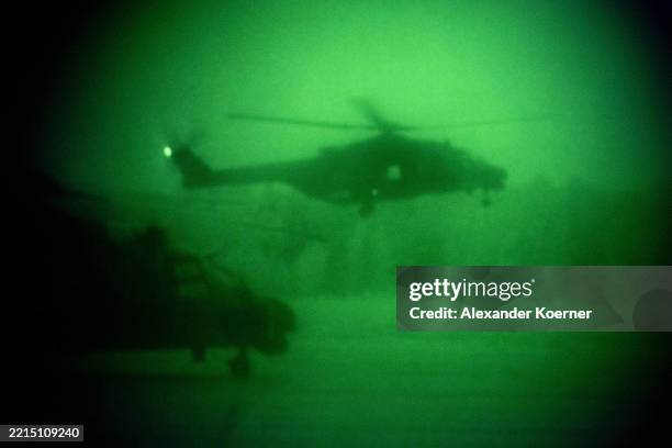 Two NH90 Helicopters of the Bundeswehr, the German Armed Forces, are seen prior take off through a night vision goggle at Griffin Lightning 2025...