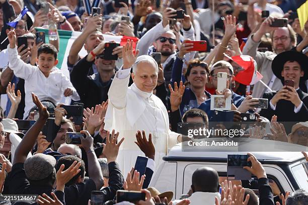 Pope Leo XIV arrives, greets the public before the Mass for the inauguration of his pontificate in St. Peter's Square at the Vatican, on May 18, 2025.