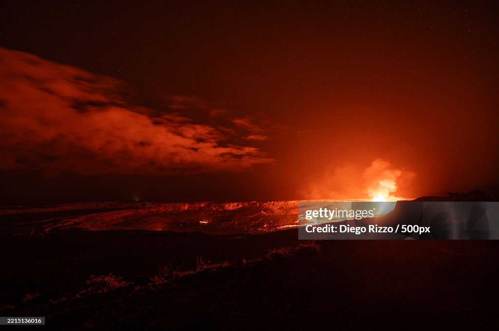Halemumau crater at night lit by the lava fountain and lake in the floor,Kilauea,Hawaii,United States,USA