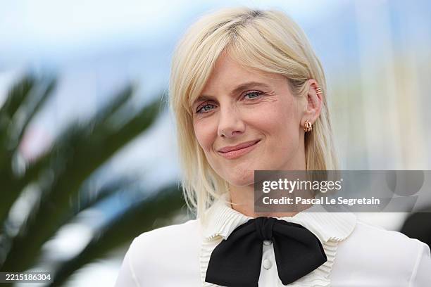 Mélanie Laurent poses during the "Qui Brille au Combat" photocall at the 78th annual Cannes Film Festival at Palais des Festivals on May 15, 2025 in...
