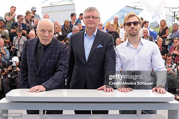 Aleksandr Filippenko, Sergei Loznitsa and Aleksandr Kuznetsov pose during the "Two Prosecutors" photocall at the 78th annual Cannes Film Festival at...