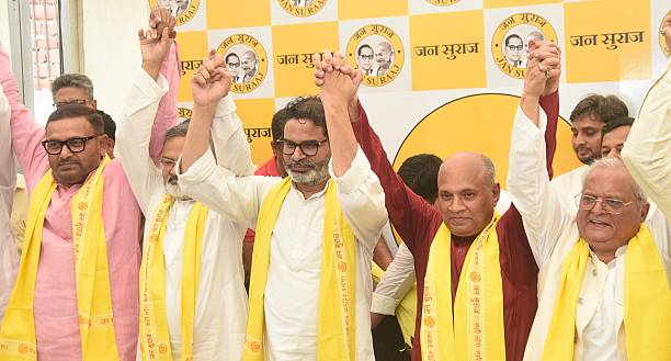 Jan Suraaj party Chief Prashant Kishor welcomed Aap Sabki Awaz party founder RCP Singh during the merger of their party at Jan Suraj Camp, Patliputra...
