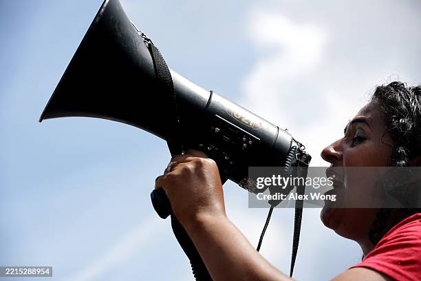An activist shouts slogans during a protest outside the U.S. Supreme Court on May 14, 2025 in Washington, DC. The Supreme Court was scheduled to hear...