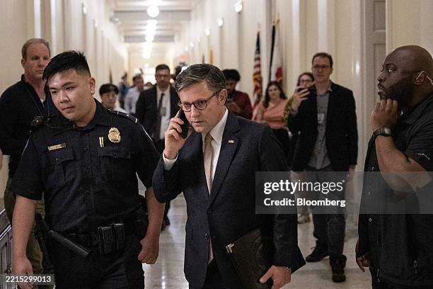 House Speaker Mike Johnson, a Republican from Louisiana, center, arrives before a House Budget Committee meeting at the US Capitol in Washington, DC,...