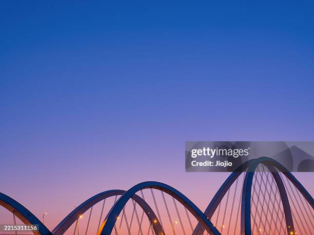 bridge structure against sky at sunset - bridge architecture up close night stock pictures, royalty-free photos & images