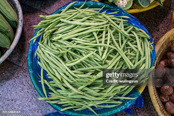 green beans in the container - green bean stock pictures, royalty-free photos & images