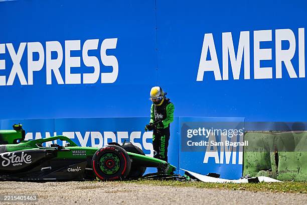 Gabriel Bortoleto of Brazil driving the Kick Sauber C45 Ferrari stands by his car after a crash during practice ahead of the F1 Grand Prix of...