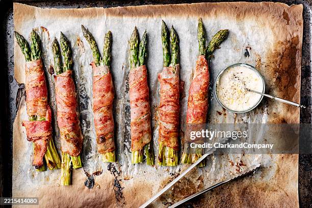 asparagus wrapped in bacon - prosciutto wrapped stock pictures, royalty-free photos & images