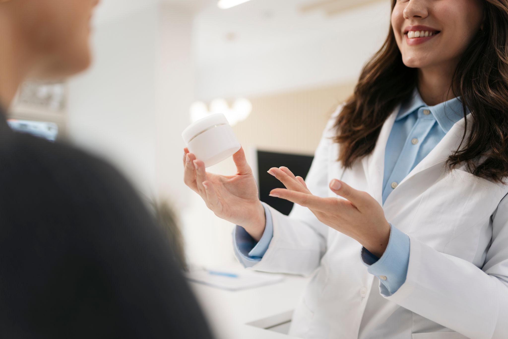dermatologist consulting patient
