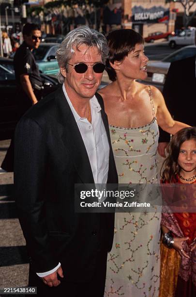 American actor Richard Gere, his partner American actress Carey Lowell and her daughter, American actress Hannah Dunne, attend the Westwood premiere...
