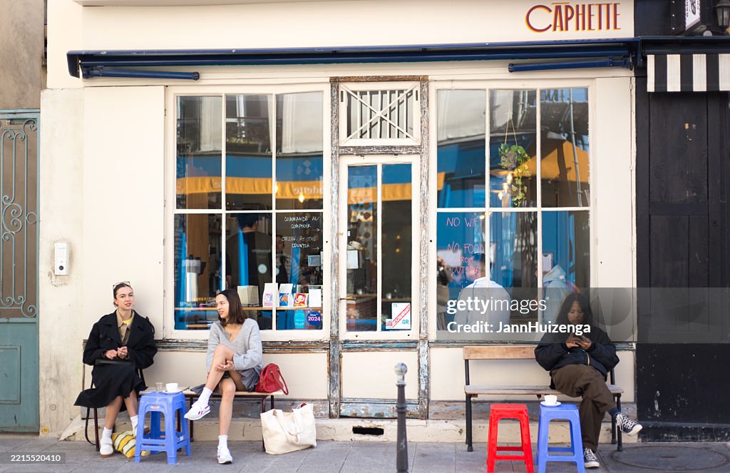 Paris, France: Young Women Outside Caphette, Oberkampf 11th