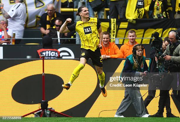 Marcel Sabitzer of Borussia Dortmund celebrates scoring his team's second goal during the Bundesliga match between Borussia Dortmund and Holstein...