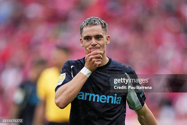 Florian Wirtz of Bayer 04 Leverkusen react during the Bundesliga match between 1. FSV Mainz 05 and Bayer 04 Leverkusen at MEWA Arena on May 17, 2025...