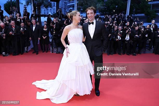 Jennifer Lawrence and Robert Pattinson attend the "Die My Love" red carpet at the 78th annual Cannes Film Festival at Palais des Festivals on May 17,...