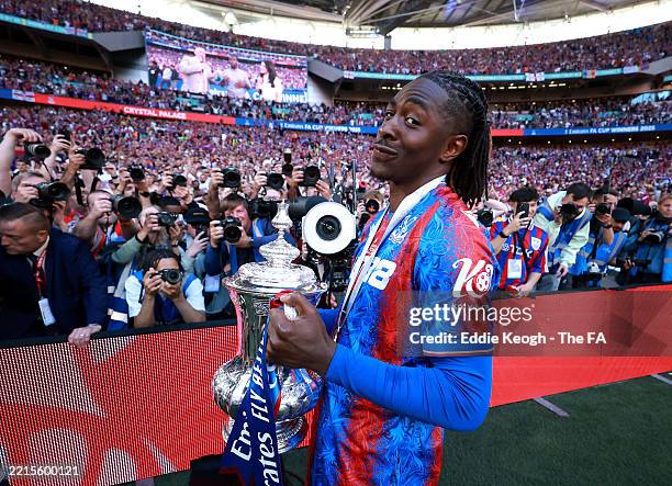 Eberechi Eze of Crystal Palace celebrates with the FA Cup trophy after his team's victory in the Emirates FA Cup Final match between Crystal Palace...