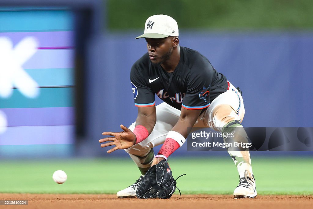 Miami Rays Ronny Simon of the Miami Marlins fields a hit against the Tampa Bay ...