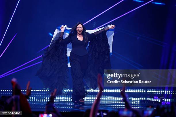 Yuval Raphael representing Israel walks on stage during the Grand Final of the 69th Eurovision Song Contest Opening Ceremony at St. Jakobshalle on...