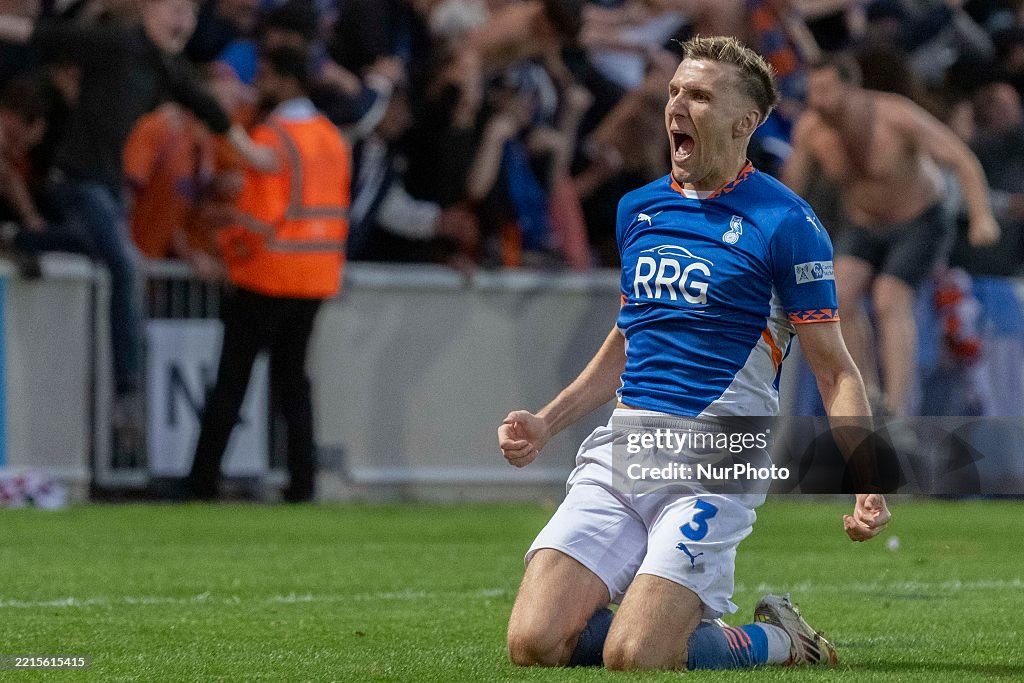 Mark Kitching of Oldham Athletic celebrates his team's third goal